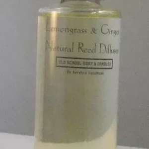 a bottle of natural reed fragrance sitting on a counter