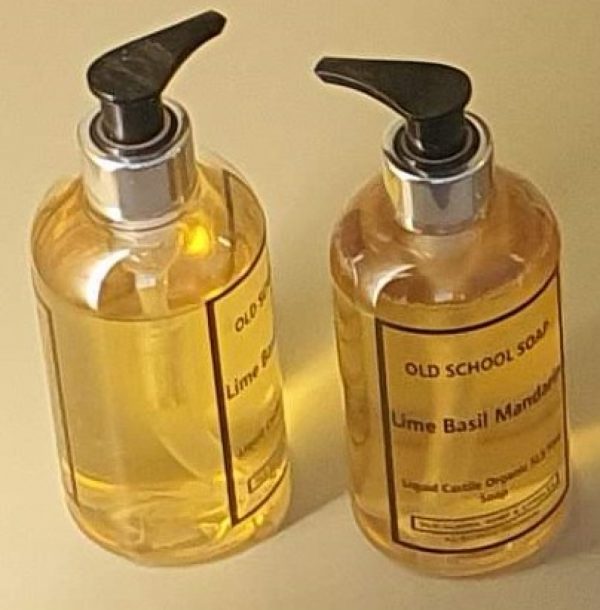 two bottles of soap with a black pump