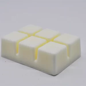 a white square of wax on a white surface
